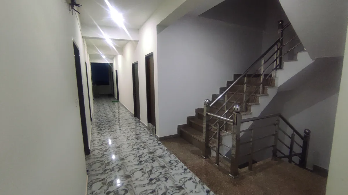 Well-lit common corridor at Daksh Home hostel near UPES Kandoli Dehradun
