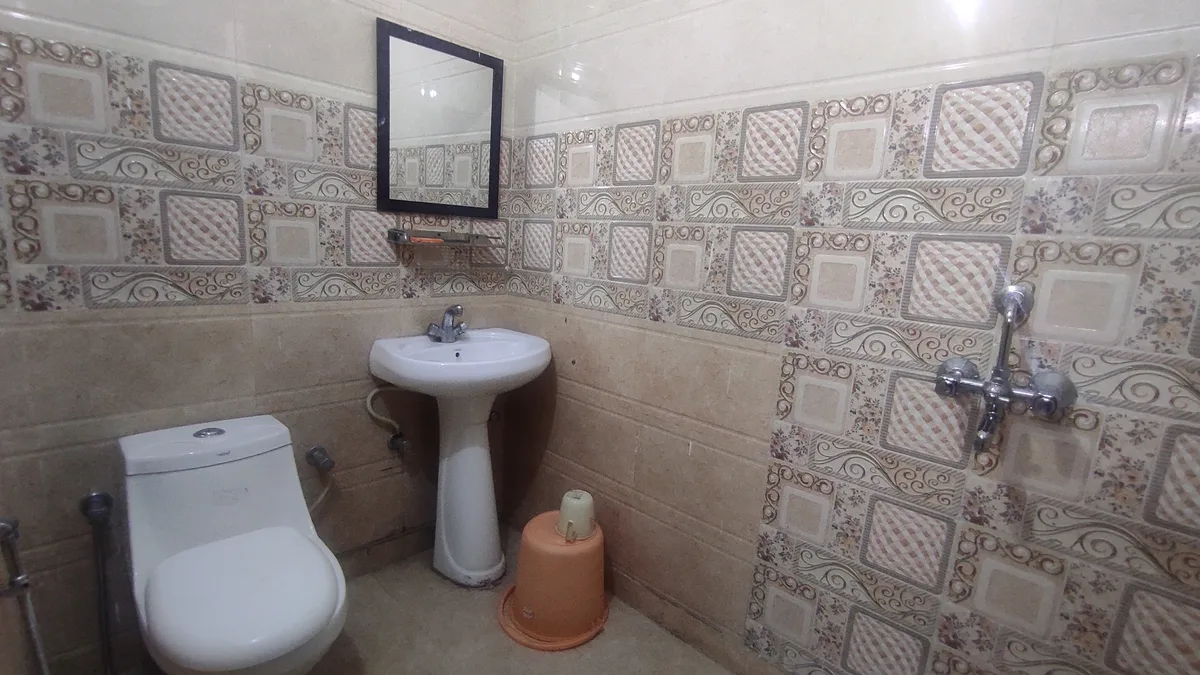 Premium bathroom with modern fixtures at Daksh Home boys hostel UPES Kandoli